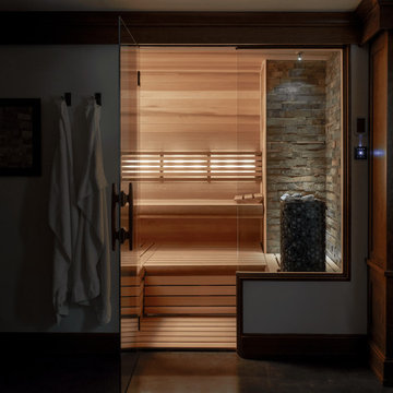 Custom Finnleo Sauna with Himalaya Heater and Stone Wall