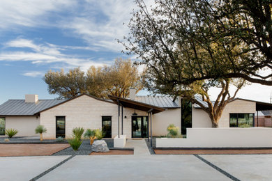 Mid-century modern exterior home photo in Austin