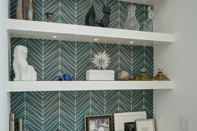 Inspiration for a small contemporary single-wall wet bar remodel in Chicago with an undermount sink, flat-panel cabinets, white cabinets, solid surface countertops and blue backsplash