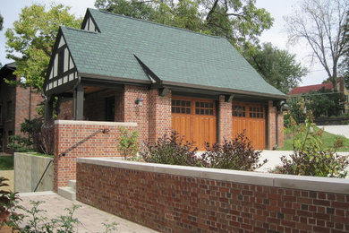 Garage - mid-sized traditional detached two-car garage idea in Cedar Rapids