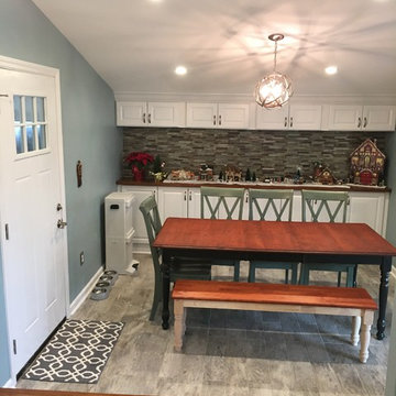 Opened wall and transformed closed room to eat-in kitchen with storage and new f