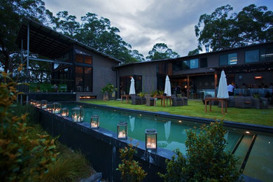 Photo of a contemporary home design in Sydney.