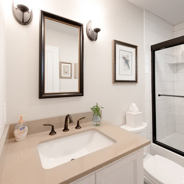 Classic white and tan Hall Bathroom