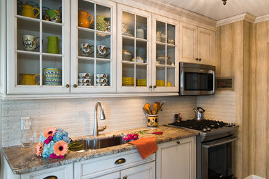 Inspiration for a mid-sized timeless galley eat-in kitchen remodel in New York with an undermount sink, stainless steel appliances and no island