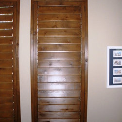 Custom Frame and Custom Color Knotty Alder Shutters - Interior Shutters