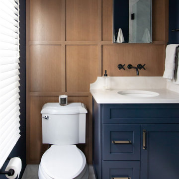 Wet Room Oasis versus Cigar Lounge Style in Dual Bath Remodel