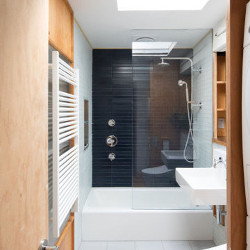 Bathroom with a skylight at our upper Manhattan townhouse renovation