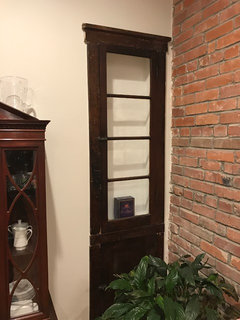 How can I replace glass shelves in a curio cabinet?