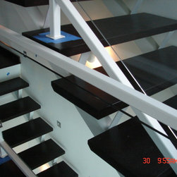 Steel stairs with glass panel - Products