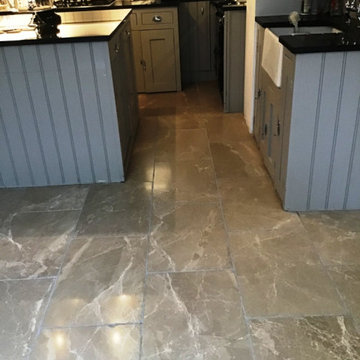 Renovating Polished Limestone Floor with Stained Grout in Wellingborough