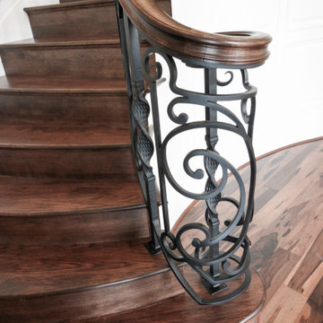 Project #74 | Circular Staircase with Hand-Forged Metal Panels