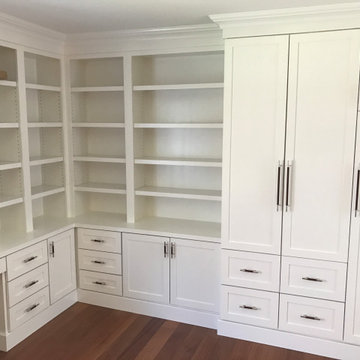 Transitional Walk-In Closet with Custom Built-Ins