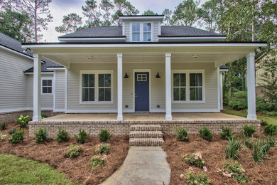 Farmhouse home design photo in Atlanta
