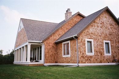Inspiration for a craftsman wood exterior home remodel in Milwaukee