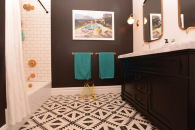 Bathroom - mid-sized transitional master subway tile porcelain tile bathroom idea in New York with shaker cabinets, brown cabinets, white walls, an undermount sink and marble countertops