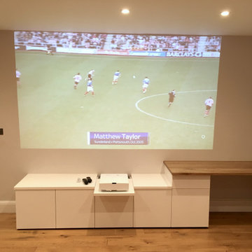 Minimalist Storage Unit with Projector and Desk