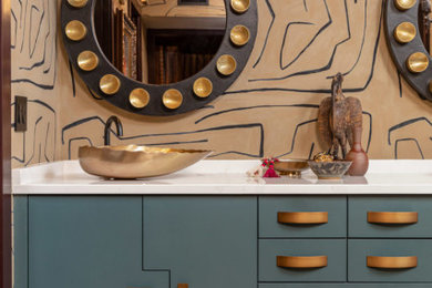 Bathroom - 1960s black floor, double-sink and wallpaper bathroom idea in Miami with flat-panel cabinets, blue cabinets, brown walls, a vessel sink, white countertops and a built-in vanity