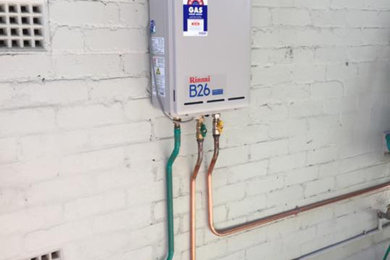 Installation of a new Rinnai instantaneous hot water system at Marrickville