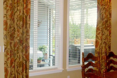 Example of a transitional dining room design in Seattle