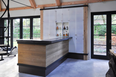 Inspiration for a contemporary home bar remodel in Amsterdam
