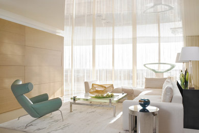 Beach style open concept wall paneling living room photo in Miami