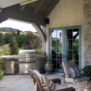 Stone Outdoor Kitchen and Fireplace