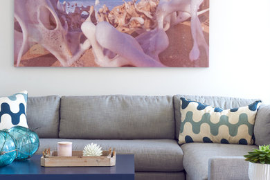 Family room - mid-sized coastal enclosed family room idea in New York with white walls
