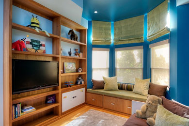Minimalist light wood floor bedroom photo in San Francisco with blue walls