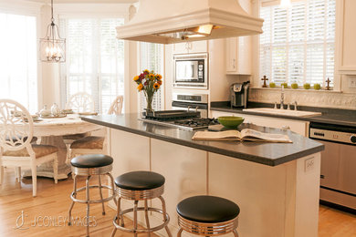 Large elegant kitchen photo in Miami