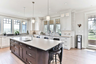 This is an example of a beach style kitchen in Calgary.