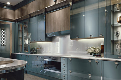 Foto di un'ampia cucina contemporanea con lavello a doppia vasca, ante lisce e elettrodomestici in acciaio inossidabile
