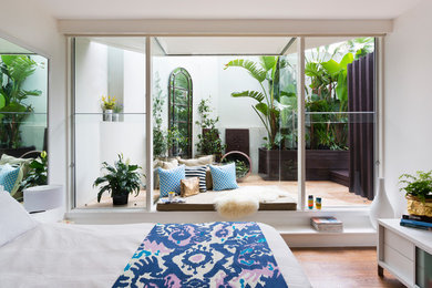 Photo of a beach style bedroom in Melbourne.