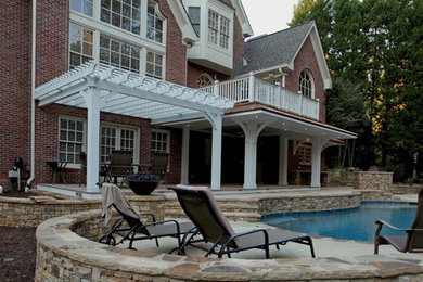 Large craftsman two-story brick gable roof idea in Atlanta