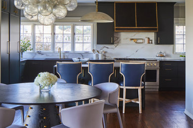 Example of a transitional dining room design in Other