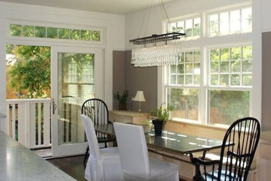 Mid-sized medium tone wood floor kitchen/dining room combo photo in San Francisco with beige walls