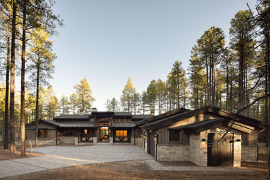Inspiration for a large rustic exterior home remodel in Phoenix