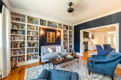 Living room library - transitional enclosed marble floor and brown floor living room library idea in Charleston with gray walls