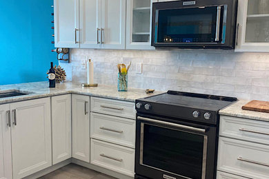 Example of a transitional kitchen design in Tampa