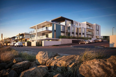 This is an example of a beach style home design in Adelaide.