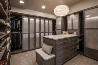 Mid-sized transitional gender-neutral carpeted and gray floor walk-in closet photo in Denver with open cabinets and gray cabinets