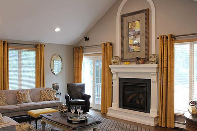 Living room - mid-sized transitional formal and open concept medium tone wood floor and brown floor living room idea in Boston with beige walls, a standard fireplace, a metal fireplace and a wall-mounted tv