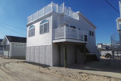 Beach style exterior home photo in Other