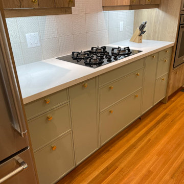 IKEA Kitchen with Custom White Oak and Sage Green Doors by Allstyle