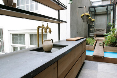 Example of a trendy kitchen design in Amsterdam