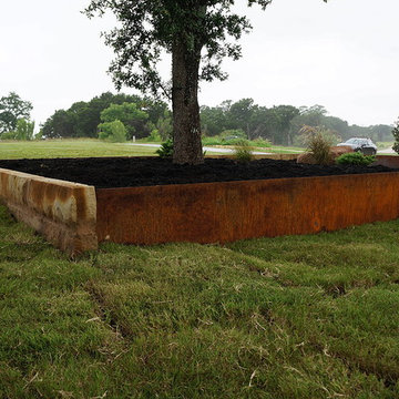 Rusted Steel + Sandstone Planter Box. [Ranchland Hills Residence]