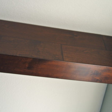 Drywall Ceiling Beams Wrapped in Distressed Hardwood Flooring