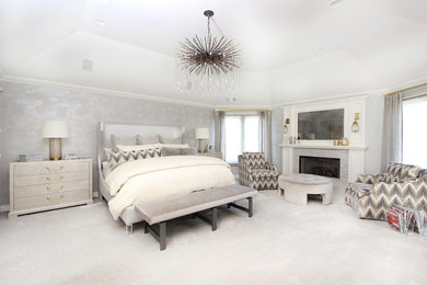 Example of a transitional bedroom design in New York