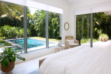 Inspiration for a large transitional master bedroom in Miami with white walls, porcelain floors, grey floor and vaulted.