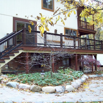 TIMBER TECH DECKING AND INFILL WITH TREX SLEEVES AND FACIA