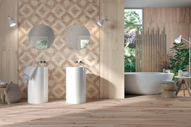 Example of a large trendy master beige tile, brown tile and porcelain tile porcelain tile and beige floor bathroom design in New York with an integrated sink